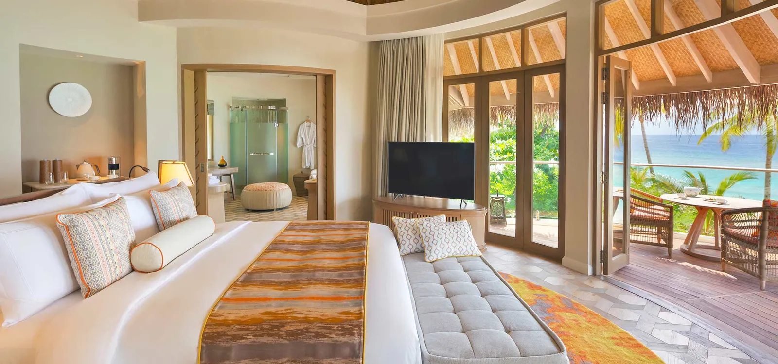 The bedroom overlooking the terrace and sea.