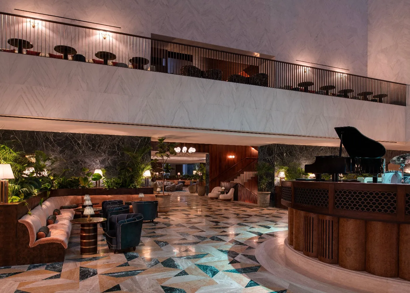 The Nickel Lounge, its bar, lamps and velvet chairs