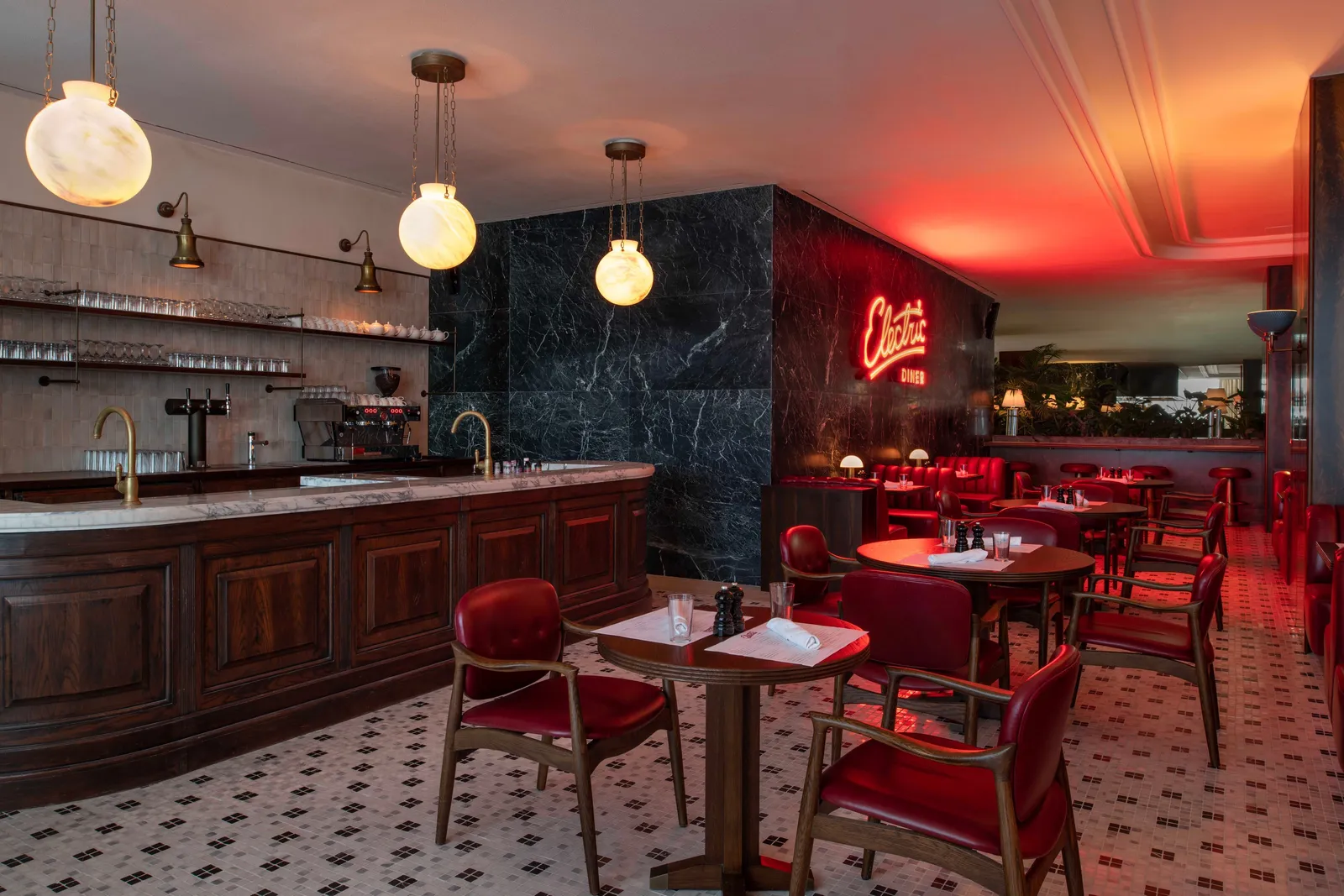 The Electric Diner bar with red lights and chequered tables