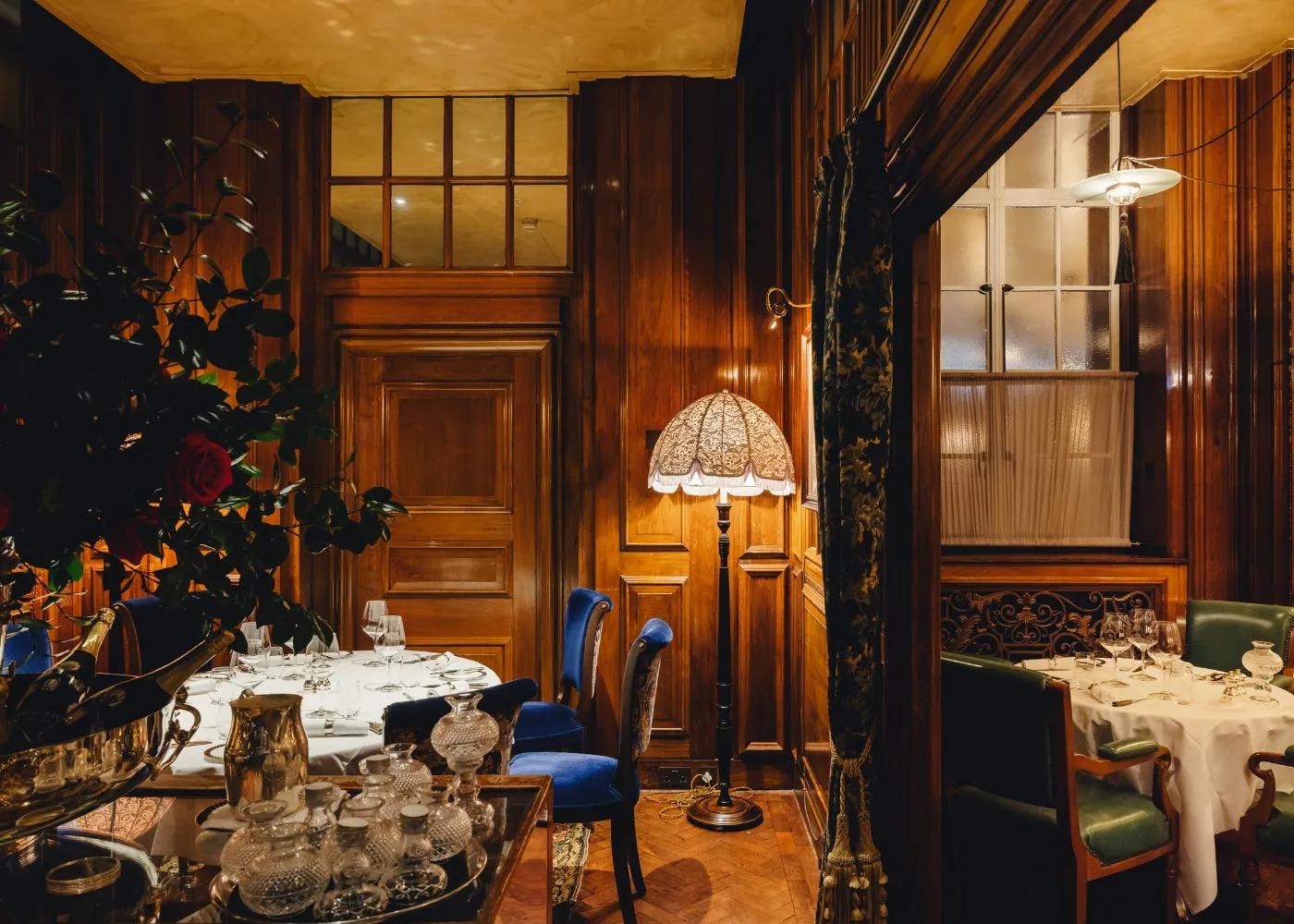 Lutyens Grill, the former bank manager’s office: wood-panelled walls, white-clothed tables and a fringed lamp