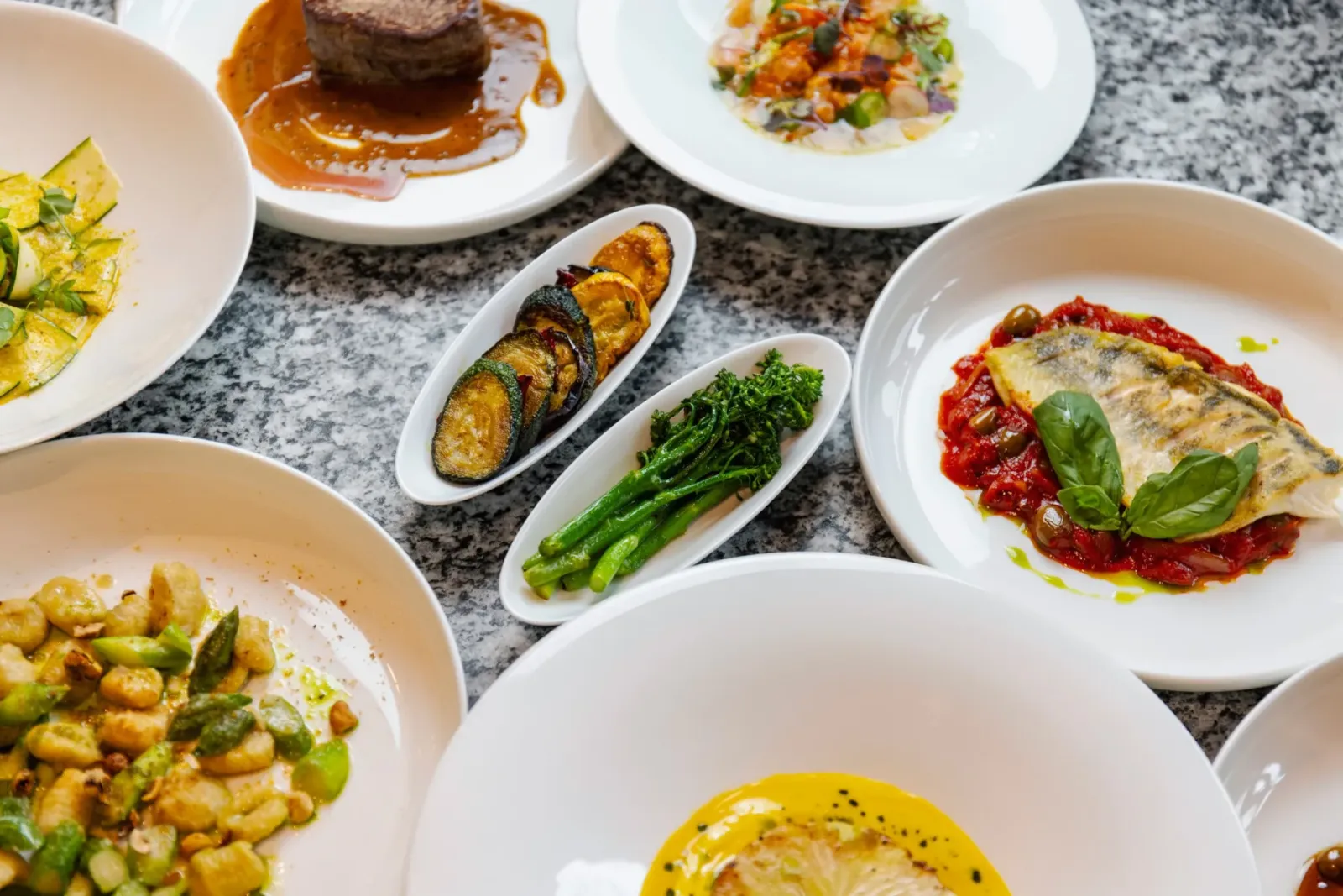 Sharing dishes on a restaurant table
