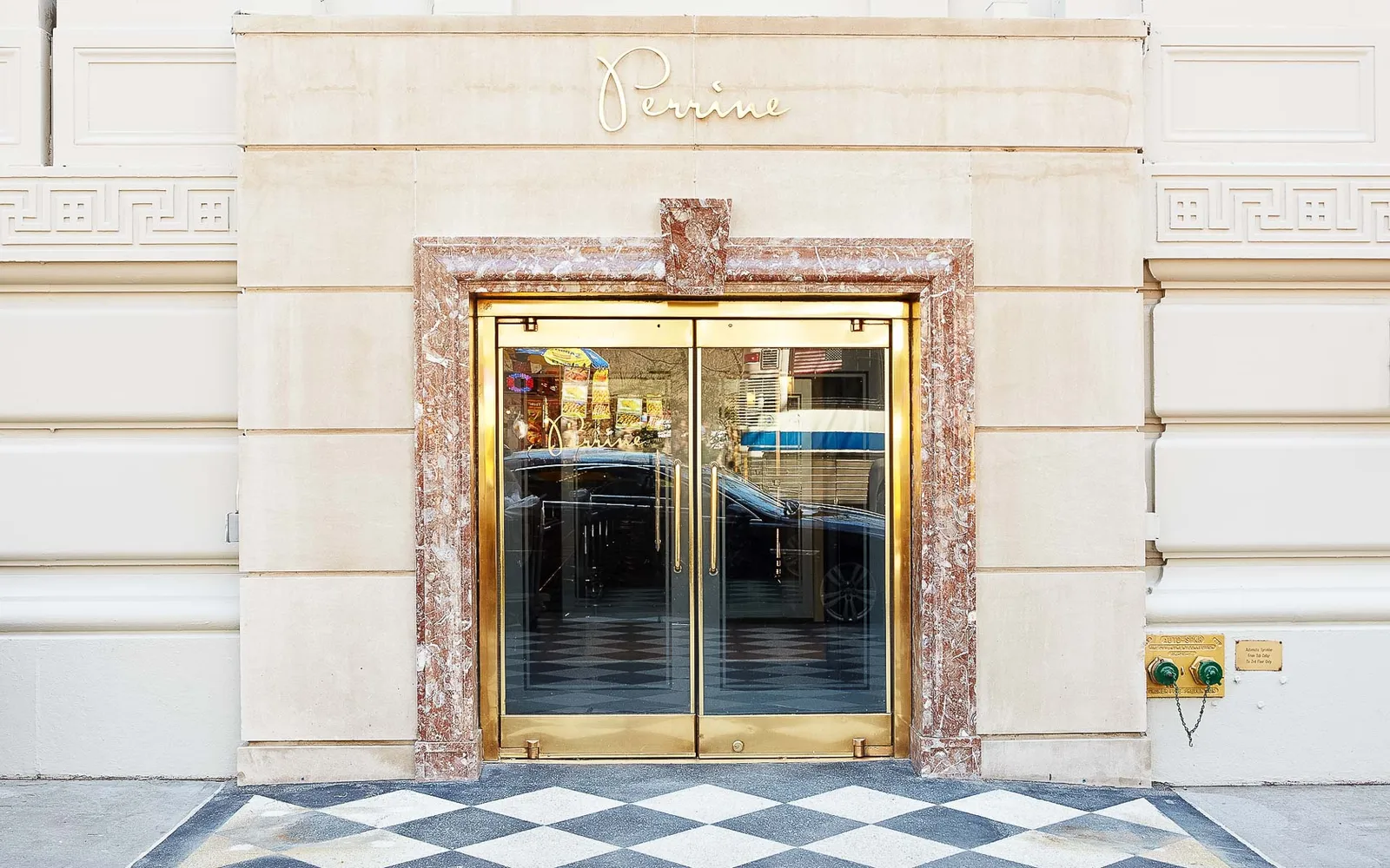 Perrine’s front door, the restaurant’s name above it