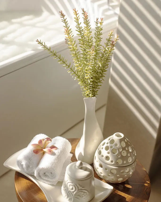 Bath products and flowers on a Lagoon Pool Villa table