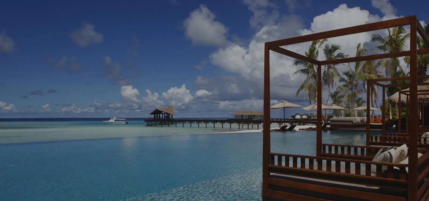 The resort pool facing the sea