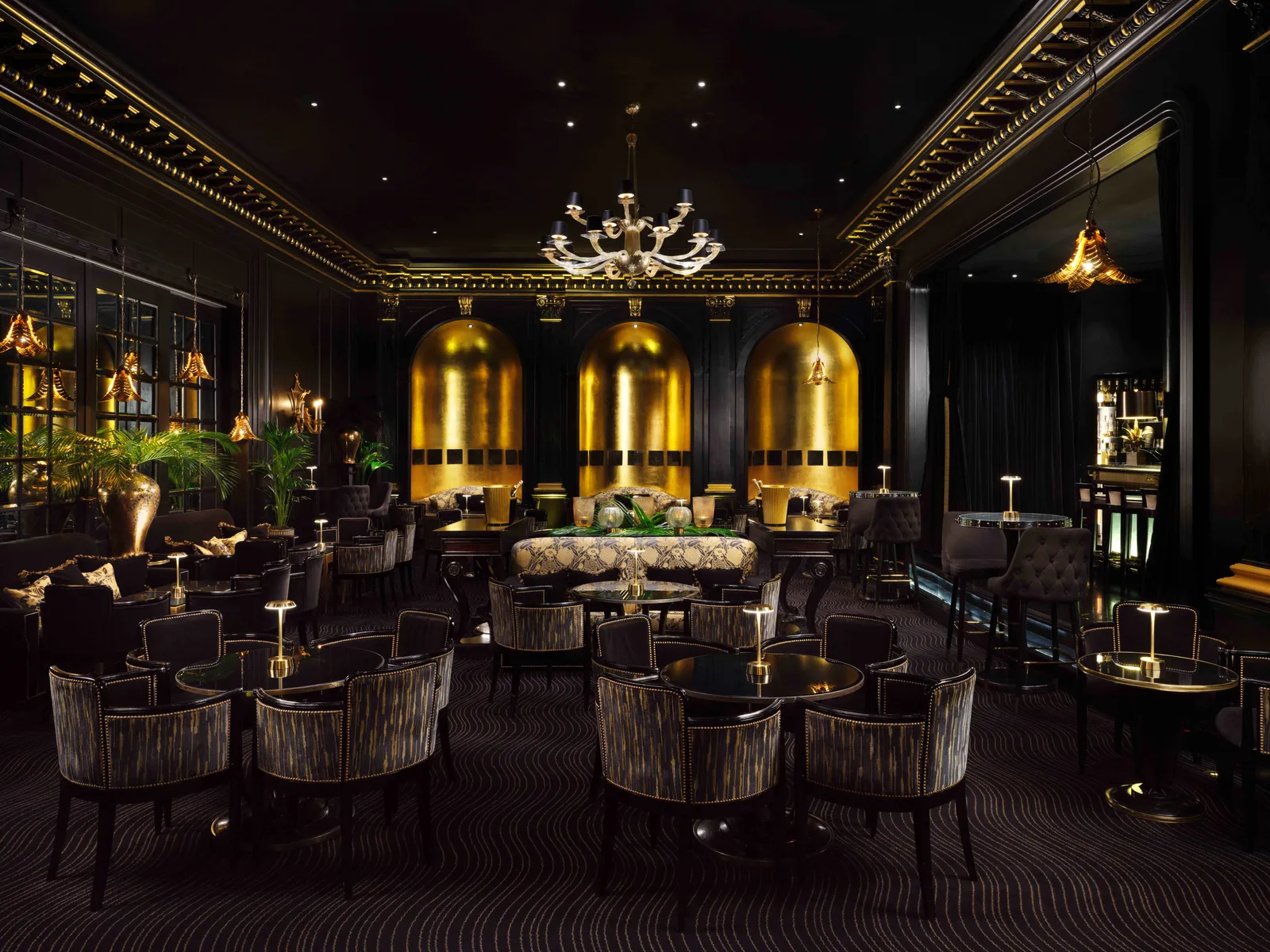 The black-and-gold Beaufort Wine Bar, with the stage at the far end