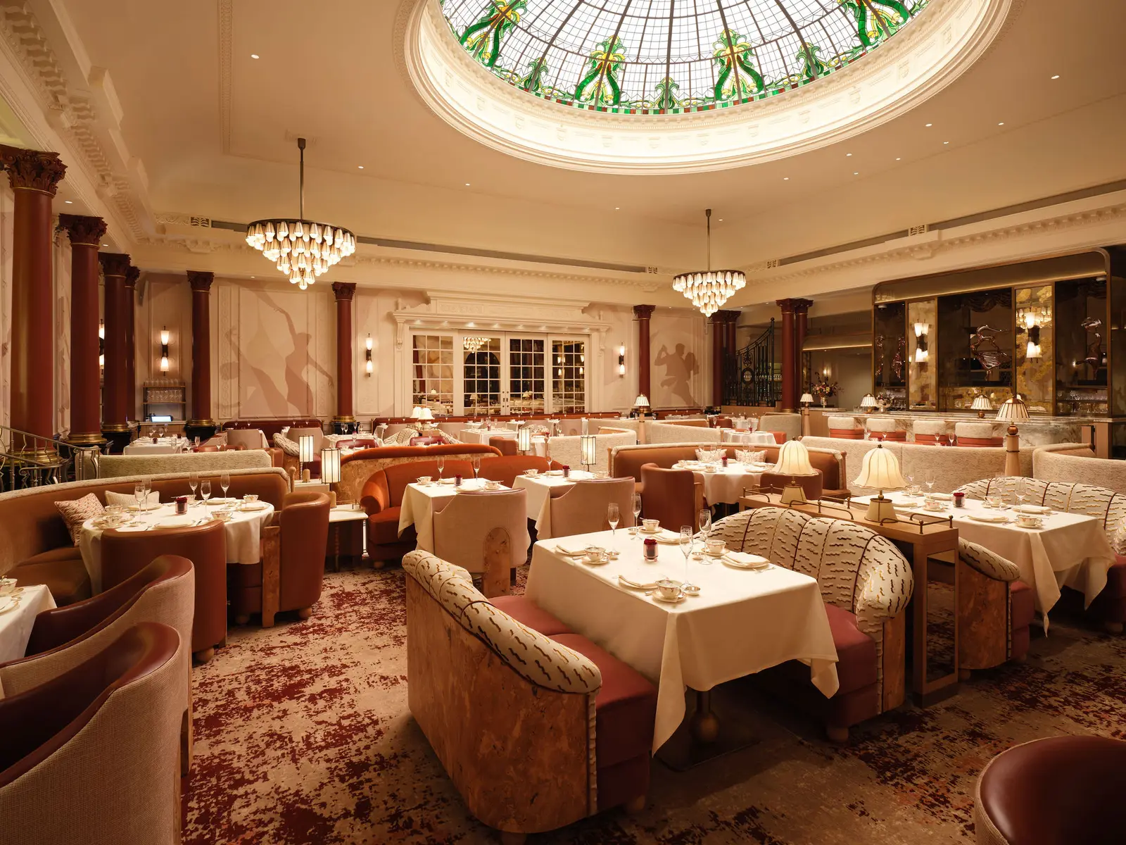 Gallery laid for tea under its stained-glass dome