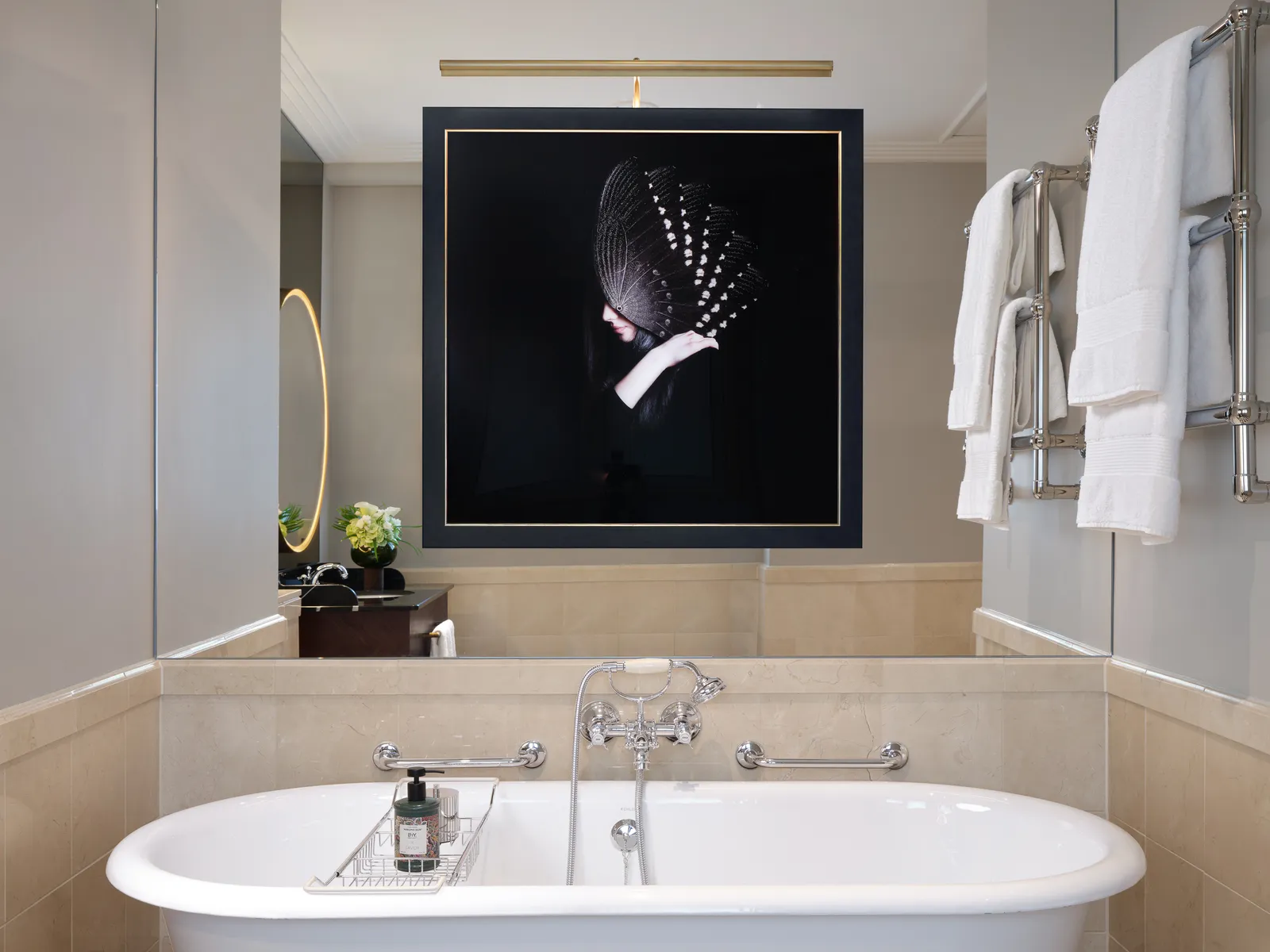 The bathroom shown for the One Bedroom Suite, with a freestanding bath