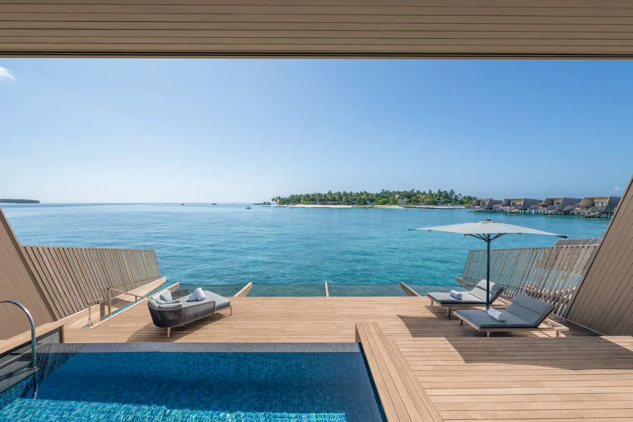 An Overwater Villa’s pool and deck above the lagoon