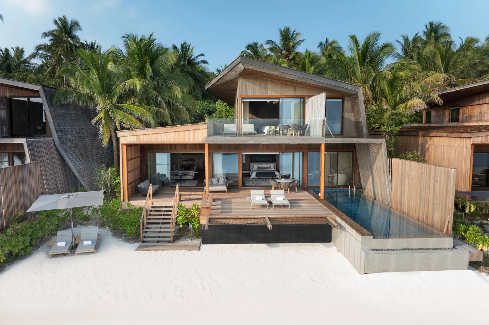 The 2-storey Two Bedroom Ocean Villa, its steps down to the sand and its infinity pool