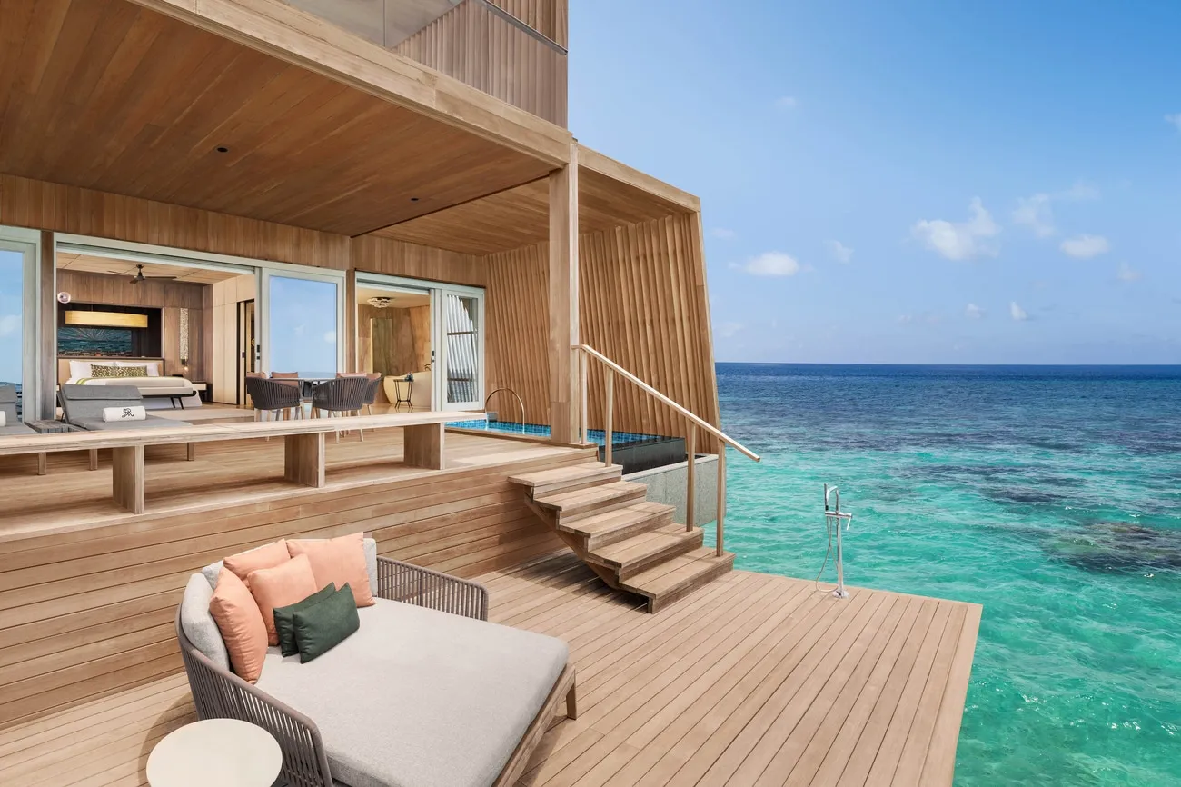 The Two Bedroom Sunset Villa deck, with its ladder down into the sea