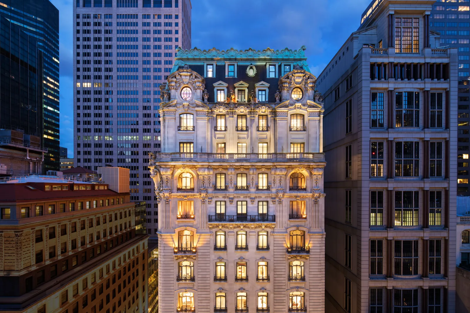 The St. Regis’s Beaux-Arts façade on 55th Street at dusk