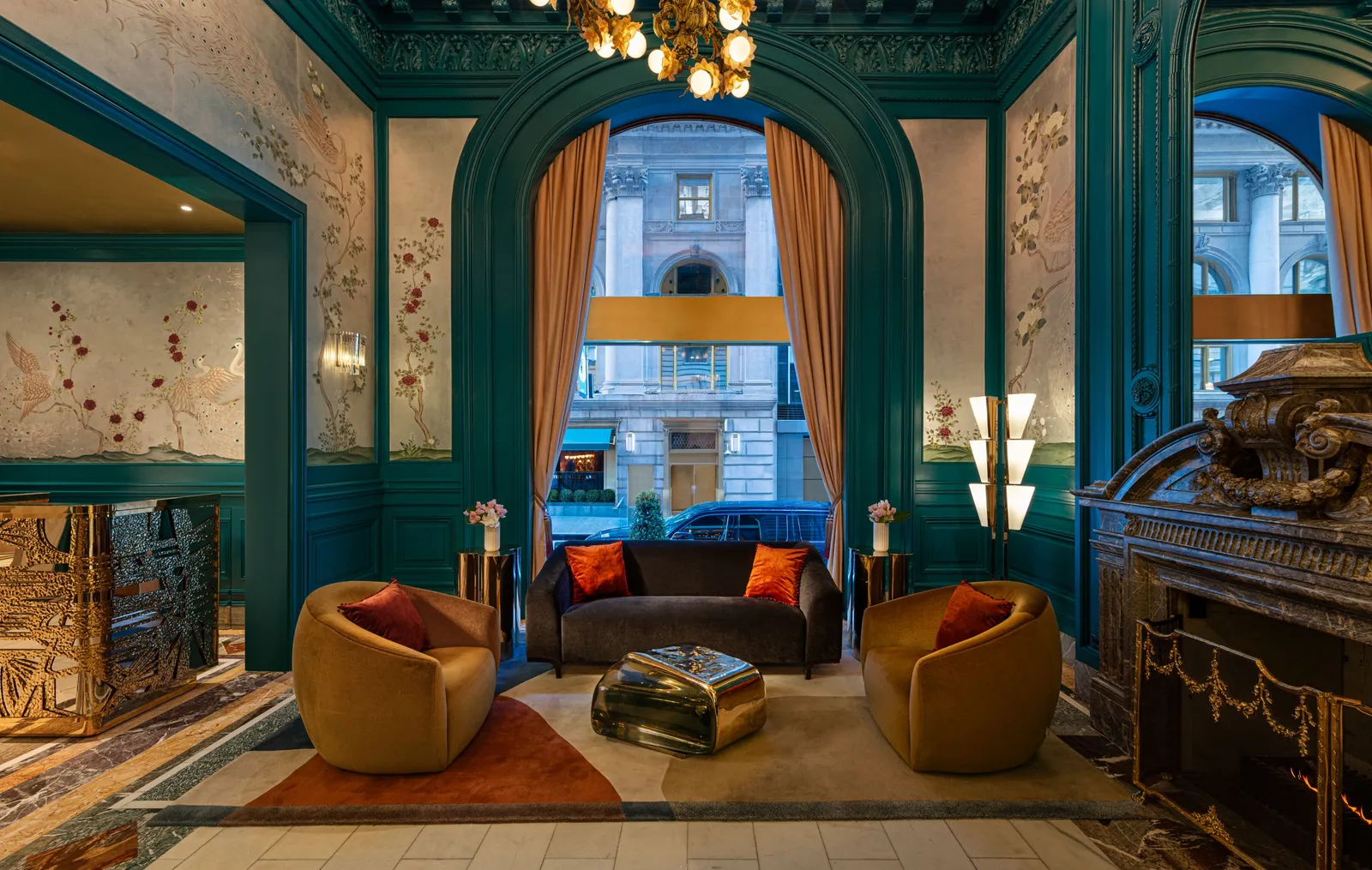 The lobby lounge with its fireplace and green walls