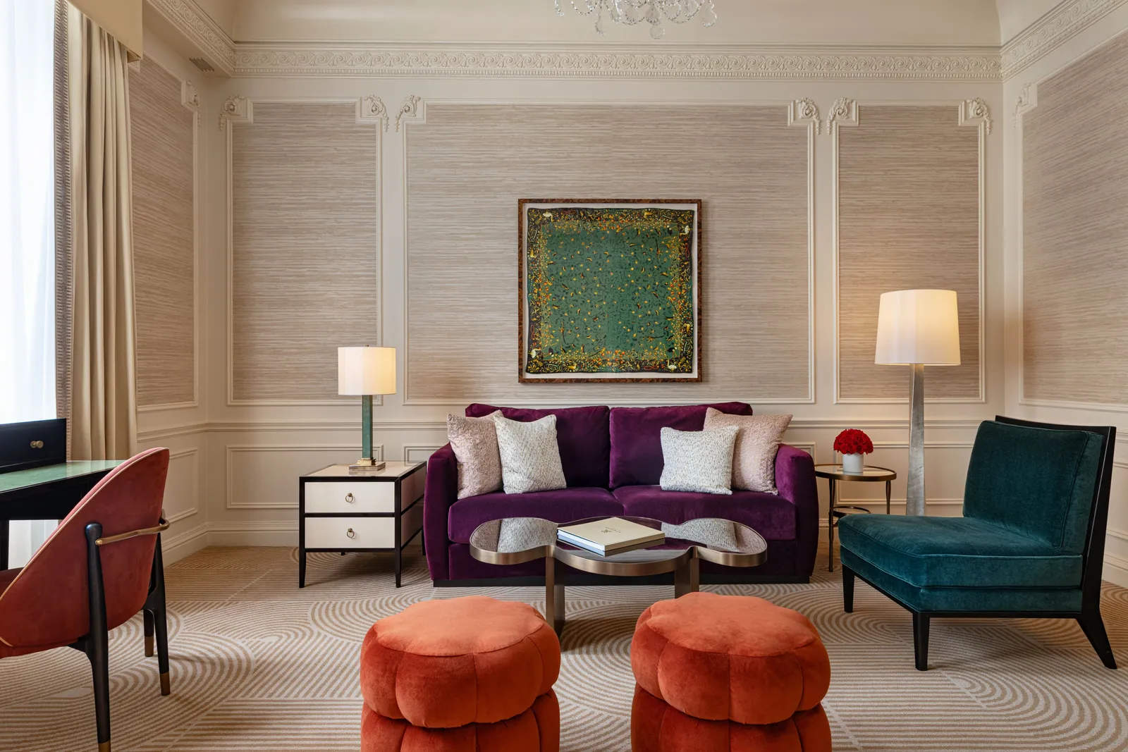 The Astor Suite sitting room with a velvet sofa