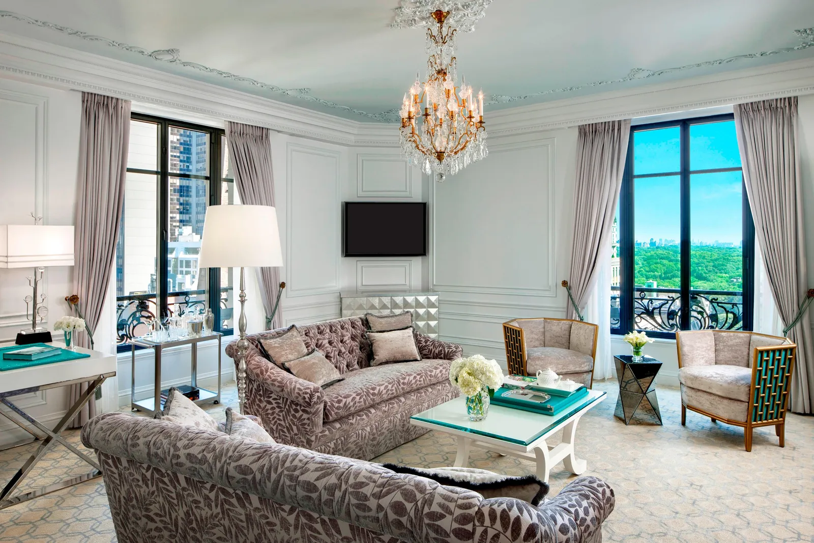 The Caroline Astor Suite living room with a view of Central Park