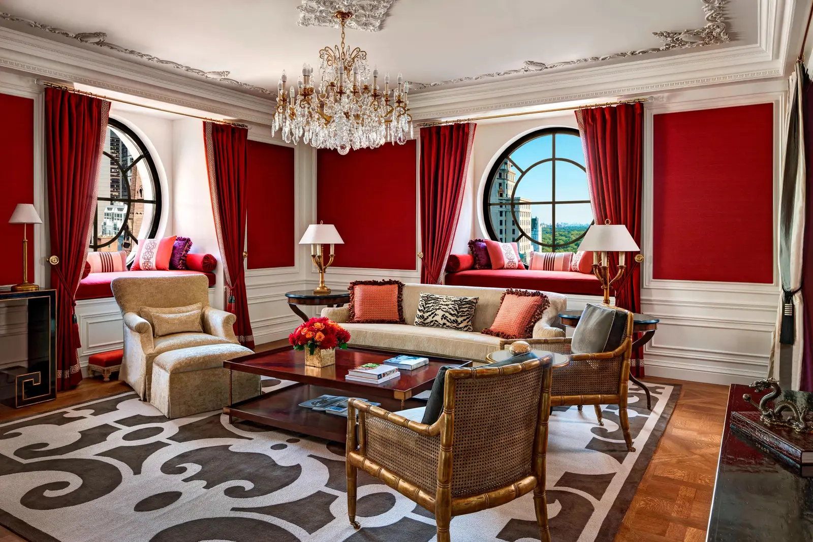 The Imperial Suite living room with red walls