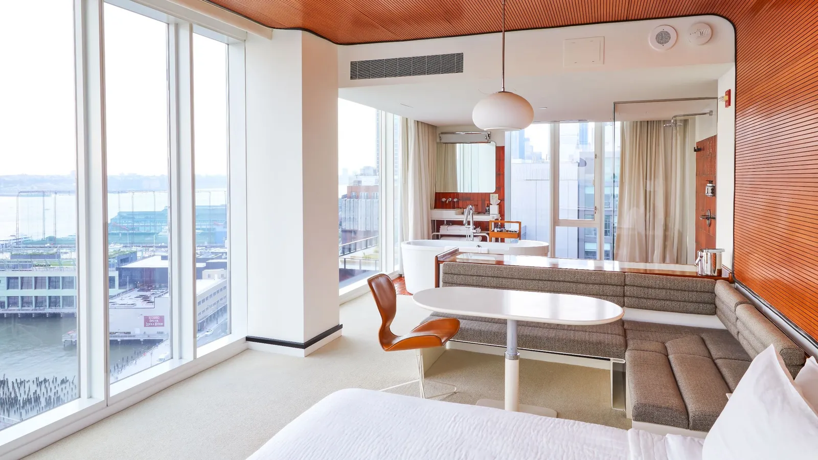 The Studio Suite with its bed, sofa and glass walls on the Hudson