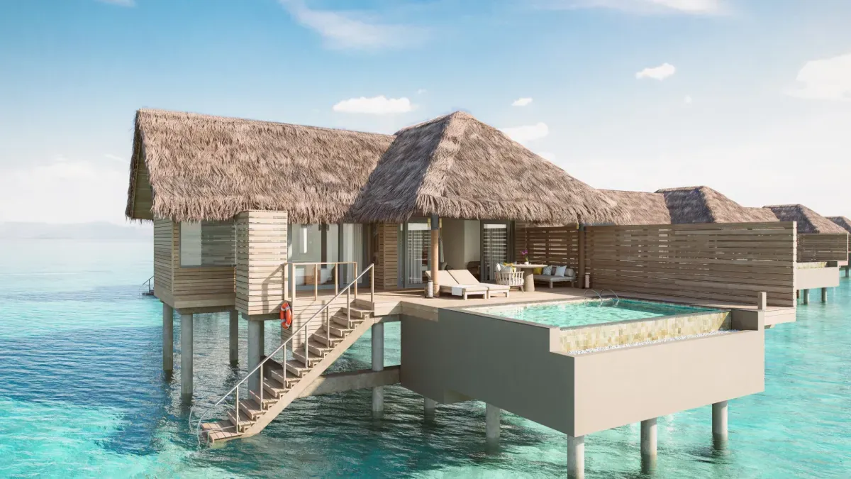 The resort’s rendering of an Overwater Villa with Pool: the pool on the deck and steps into the lagoon.