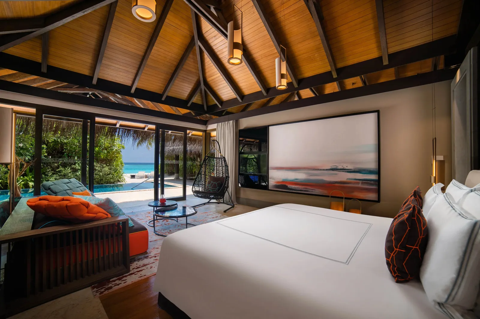 Beach Pool Villa: the bedroom open to the pool and the beach