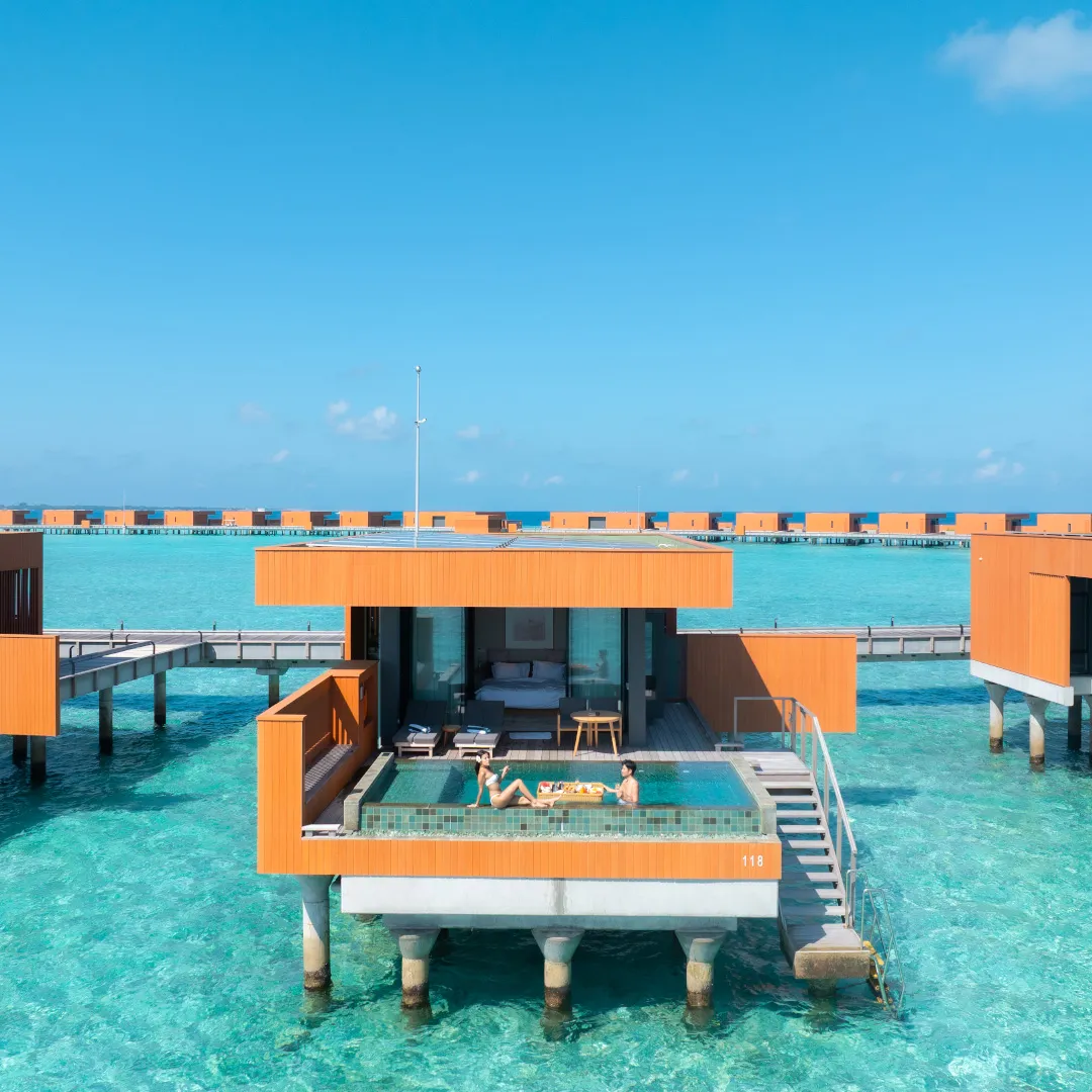 An Ocean Pool Villa over the water, with its pool and steps down to the lagoon.