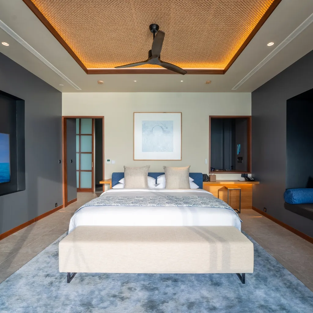 The master bedroom of a 2-bedroom Sunset Ocean Pool Villa.