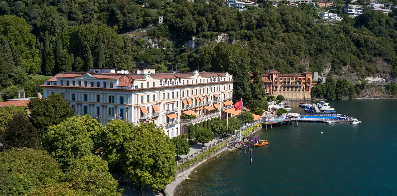 The hotel and its park on the lakeshore seen from above