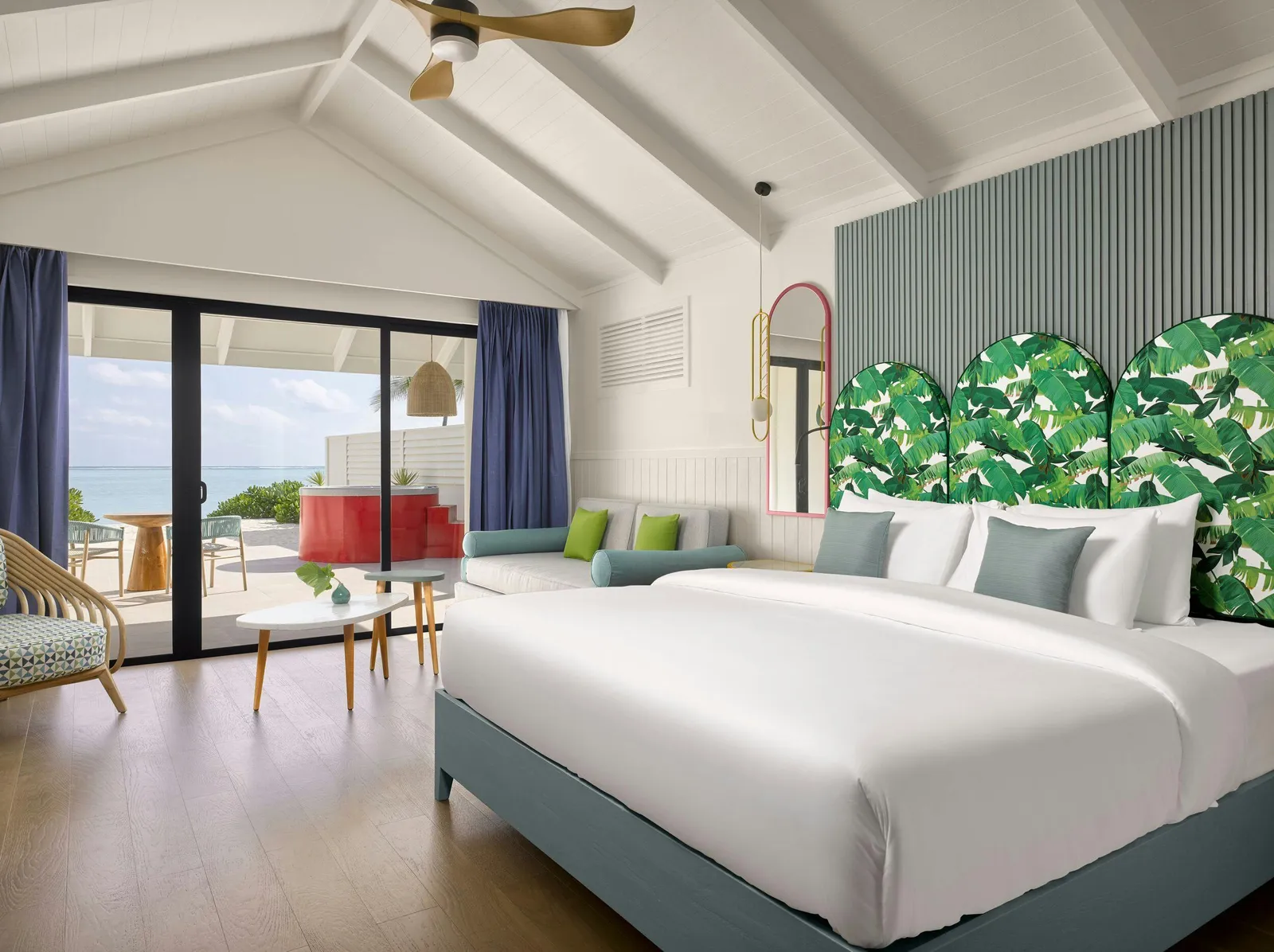 Bedroom with bed and view towards the terrace.
