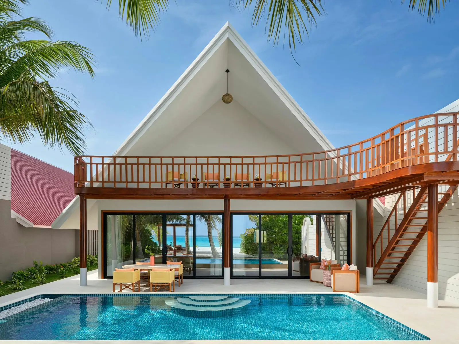 The Residence facade, pool and terraces.
