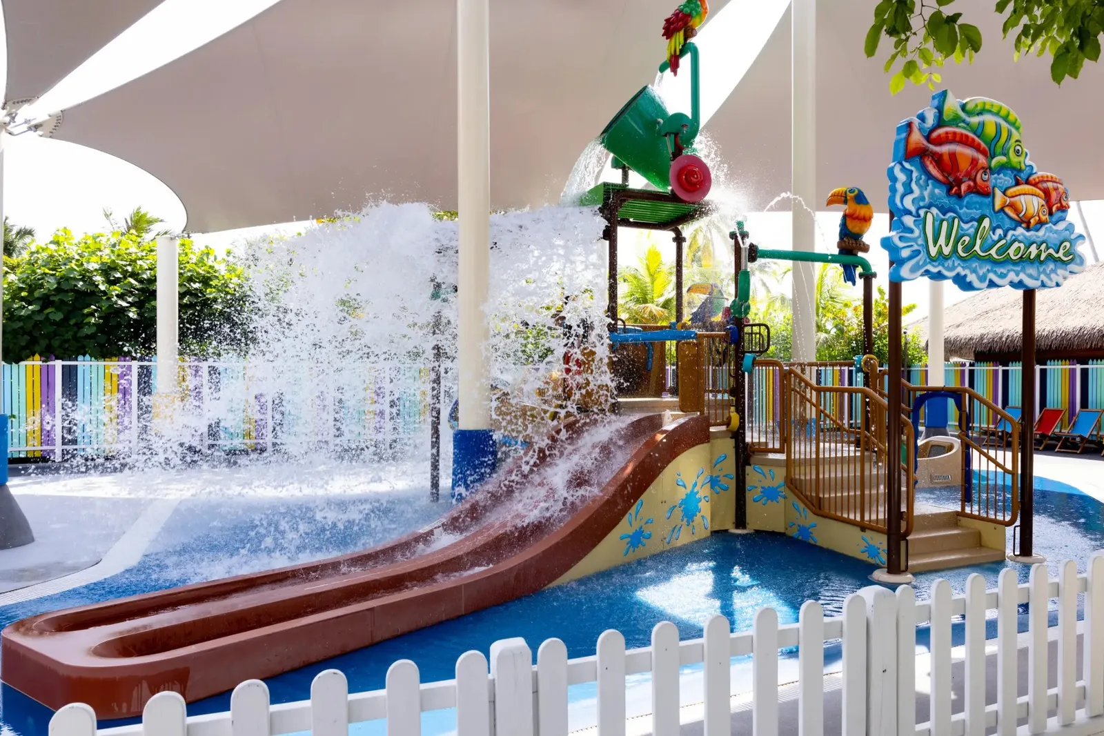 The Stars Club: the slide and water jets of the play park