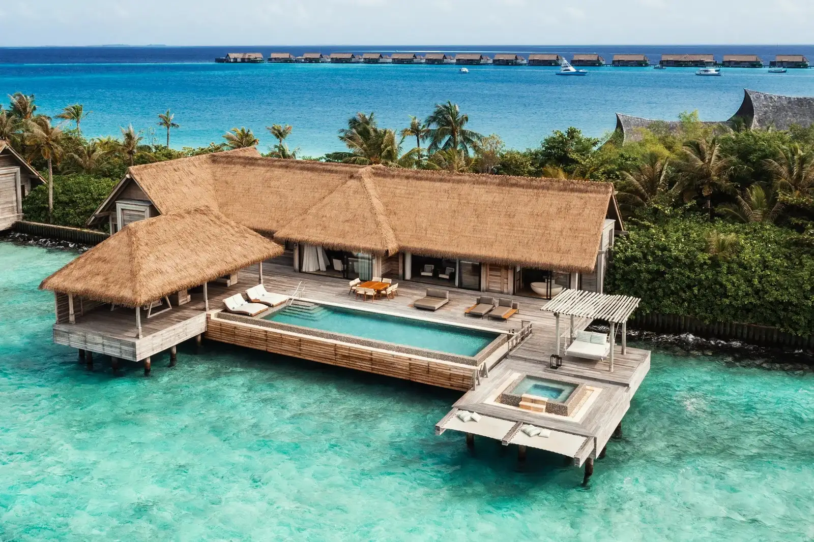 A Two Bedroom Reef Villa, its long pool and the tub on the deck