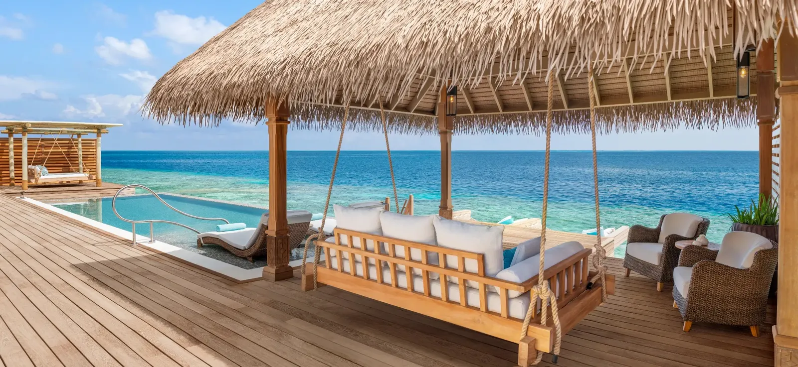 King Overwater Villa: the swing under the thatch and the pool facing the sea