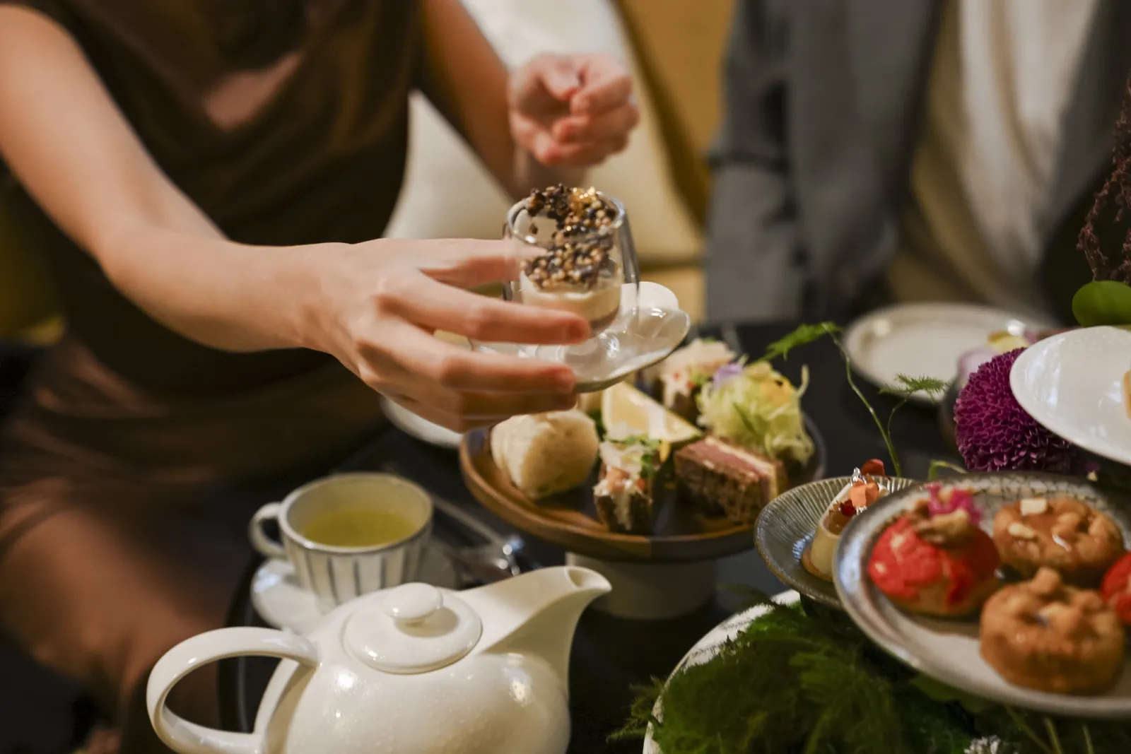 Yoshoku’s afternoon tea served at the table, sweets and cups