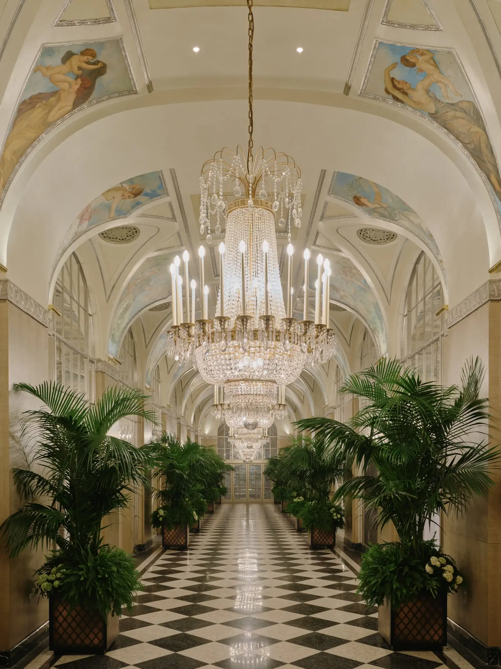 The Silver Corridor with its chandeliers and checkerboard floor