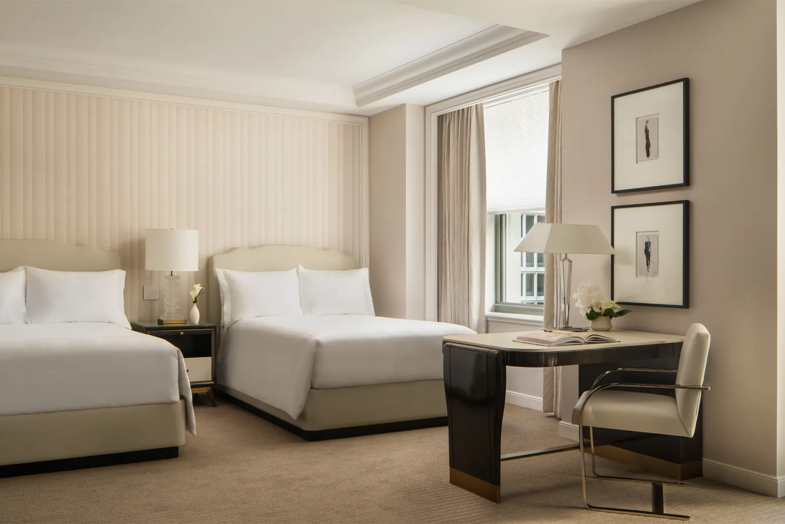 The Deluxe Two Doubles with its 2 beds and the desk at the window