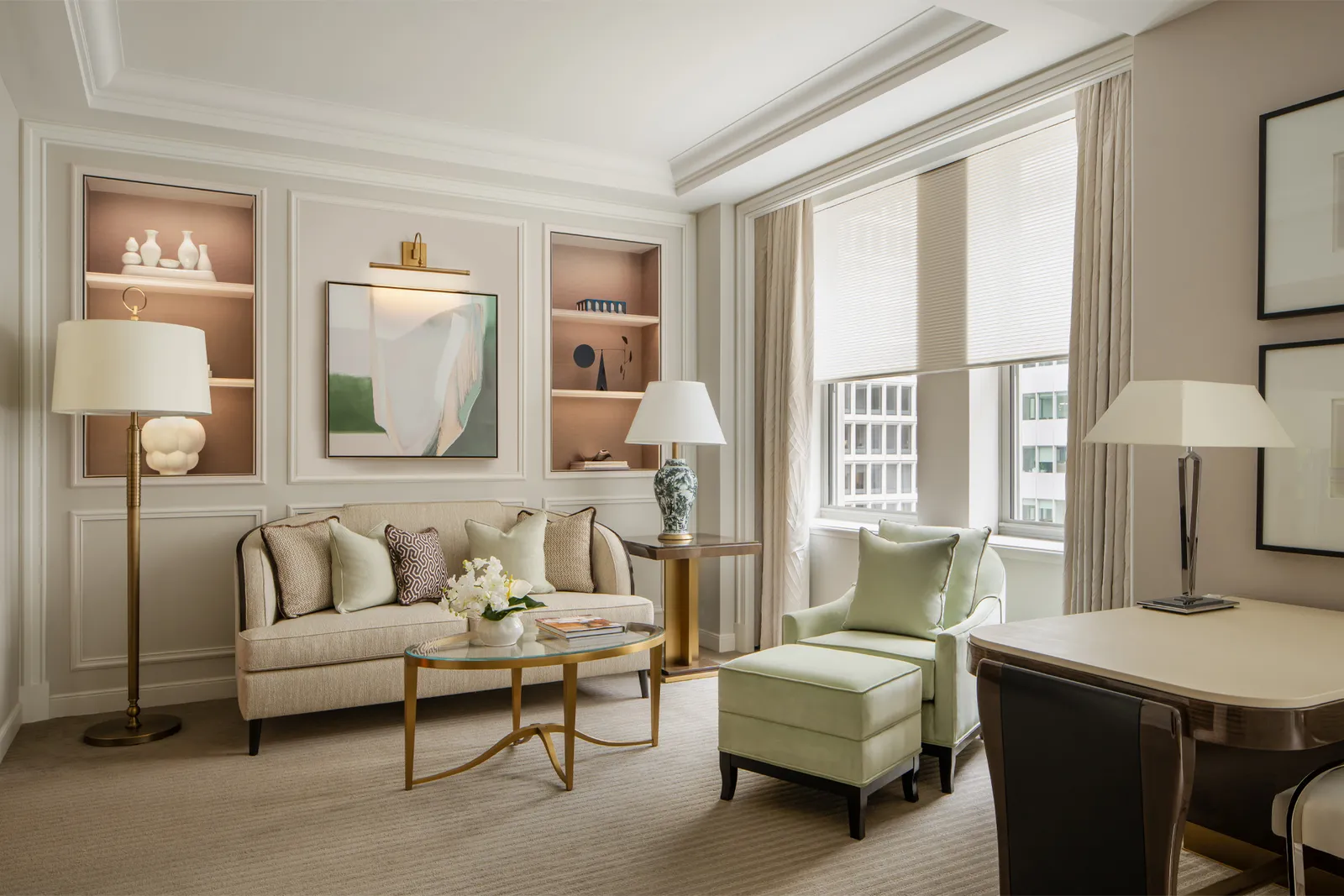 The Park Avenue Junior Suite living area, its shelves and the abstract painting