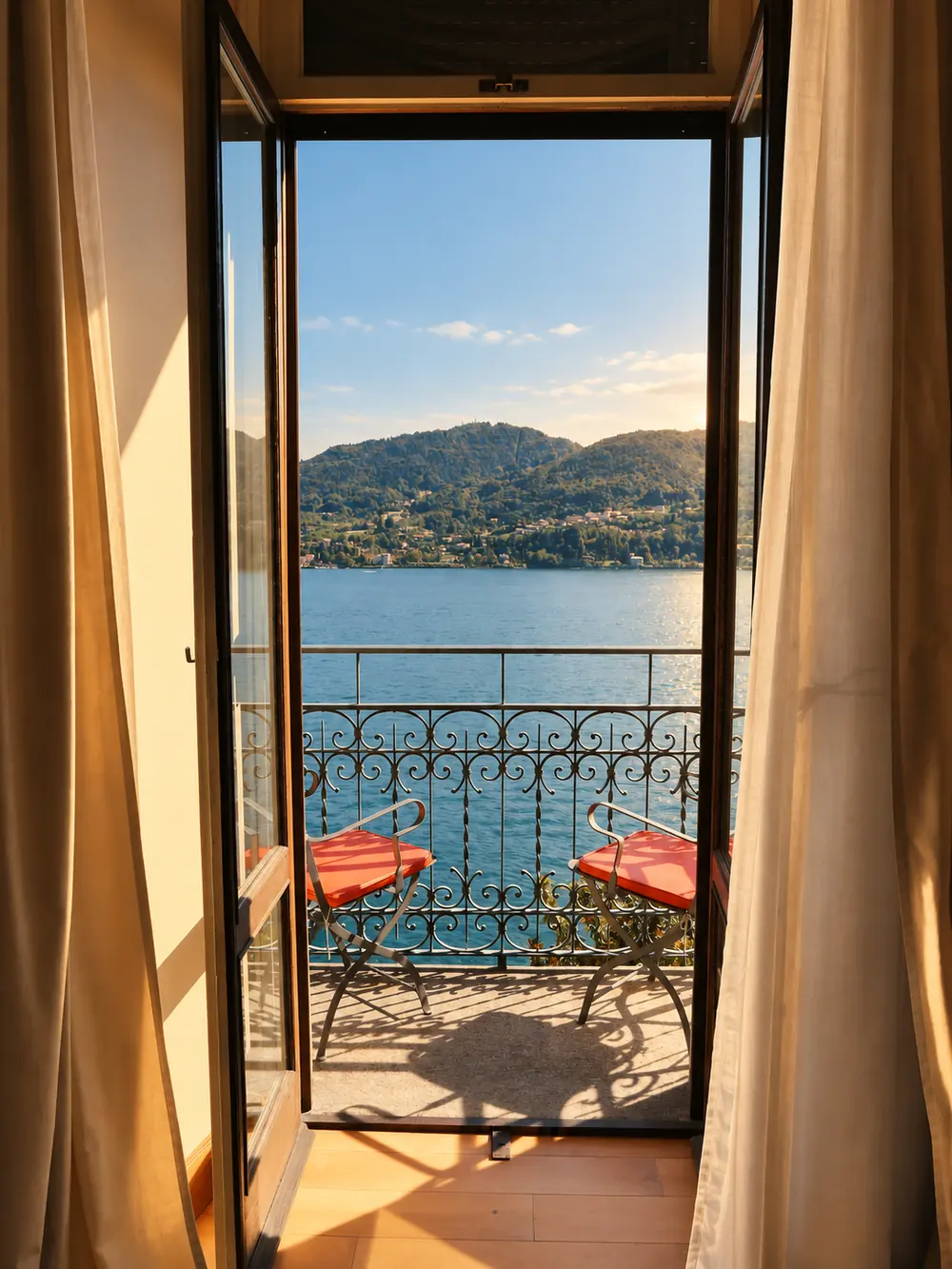A balcony overlooking Lake Como and the hills; Lumina editorial edit