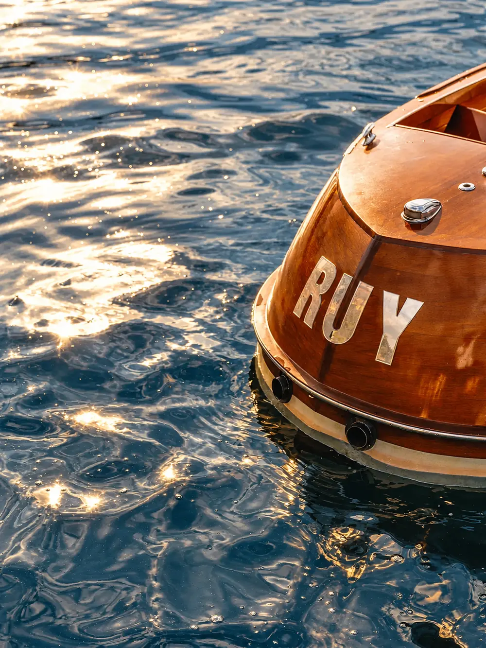 The name painted on the stern of the boat Ruy; Lumina editorial edit