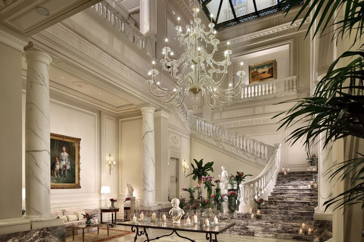 Palazzo Parigi's monumental lobby, staircase and chandelier